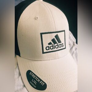 My boyfriend’s Black and White adidas Mens baseball cap. Stretch-fit.